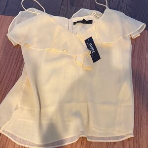 White House Black Market Soft Yellow Ruffle Blouse
